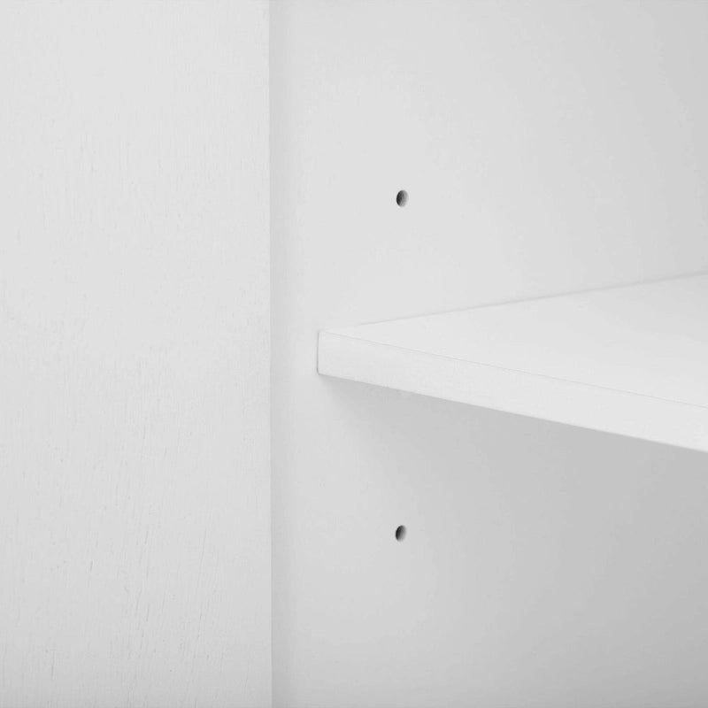Meuble de rangement luxueux avec pieds de support uniques et étagères réglables
